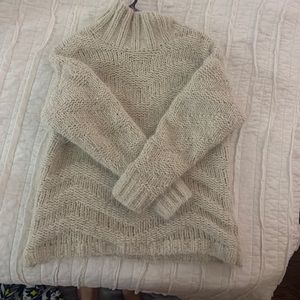 Cream fuzzy turtleneck